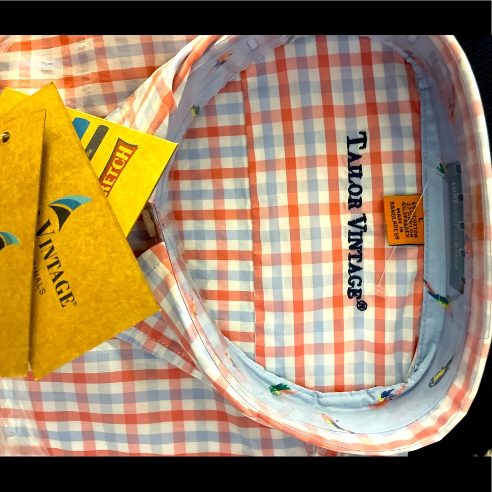 Short sleeve collared men’s dress shirt.